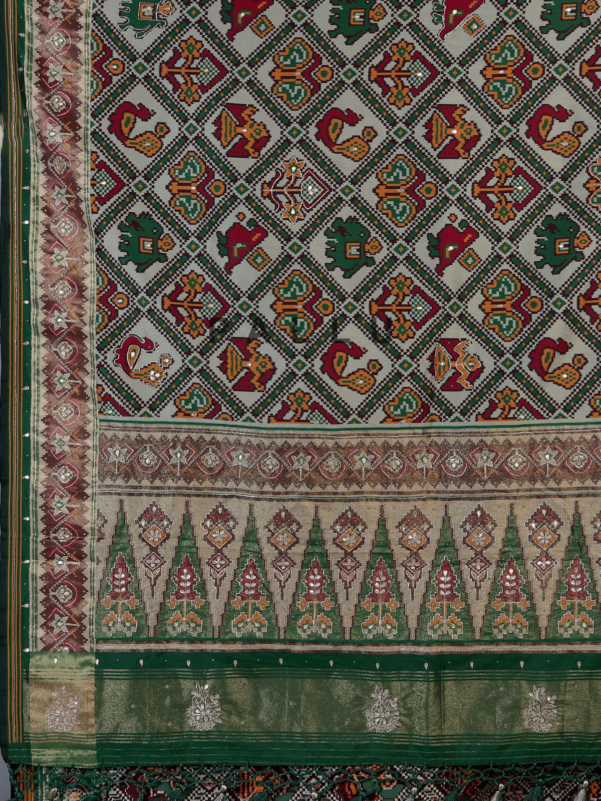 Green art patola silk saree with rich zardosi handwork