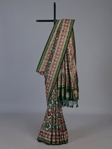 Green art patola silk saree with rich zardosi handwork