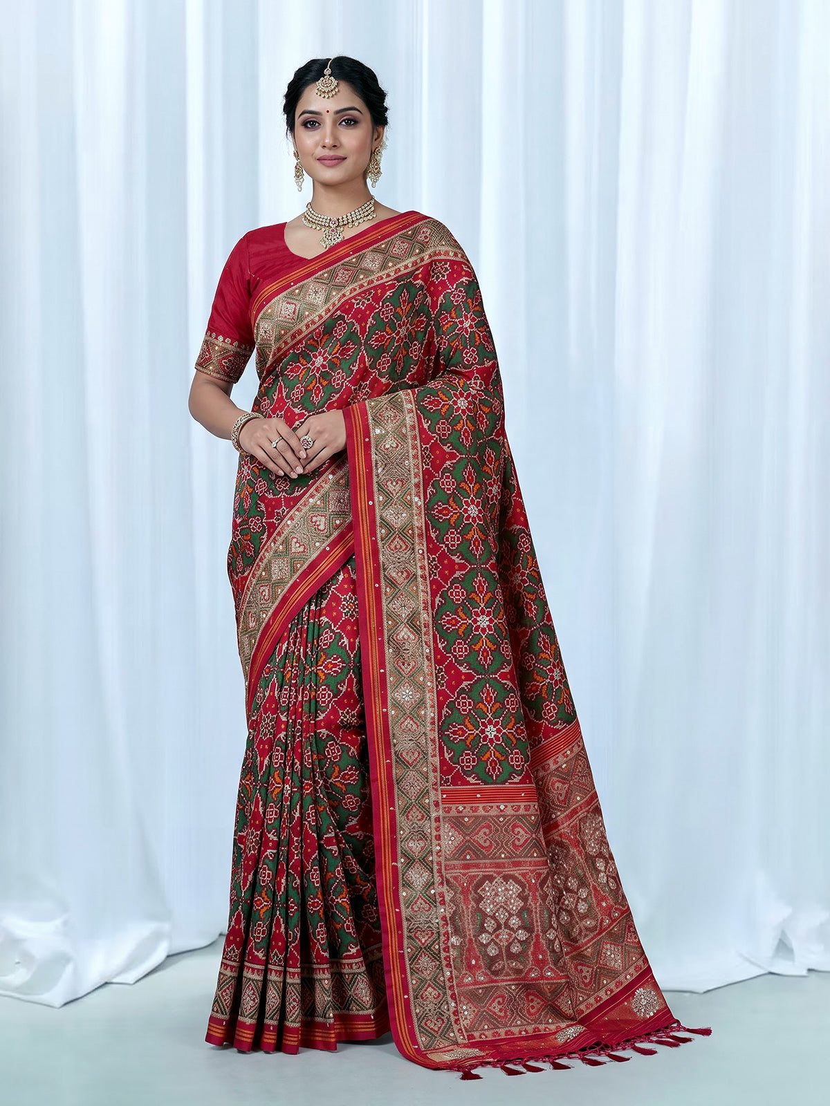 Maroon art patola silk saree with elegant traditional craftsmanship