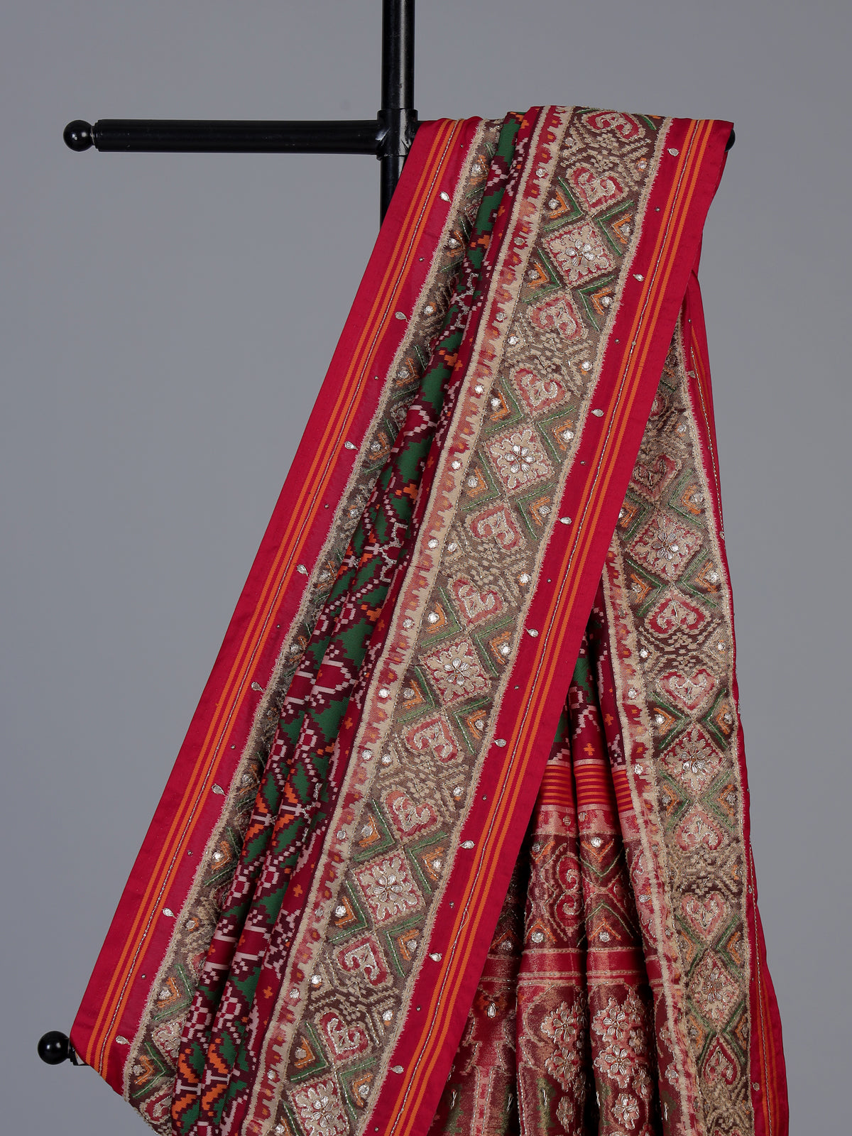 Maroon art patola silk saree with elegant traditional craftsmanship