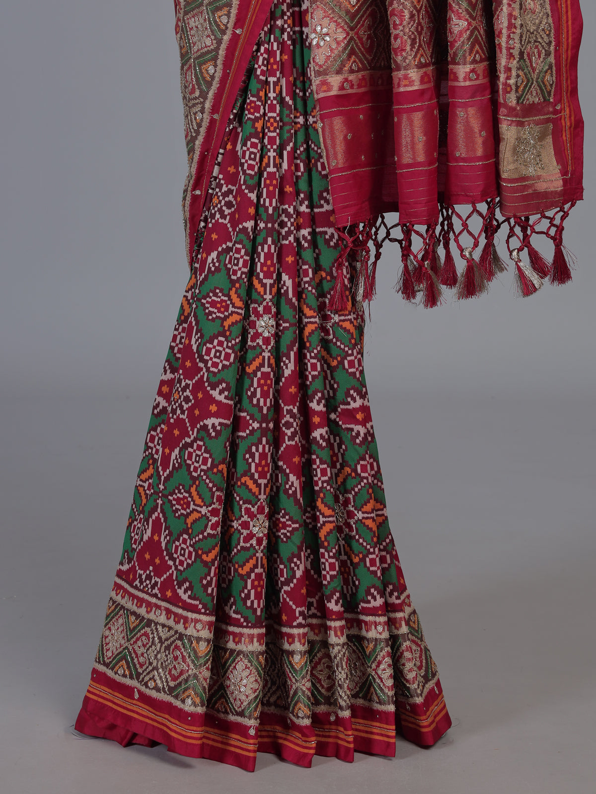 Maroon art patola silk saree with elegant traditional craftsmanship