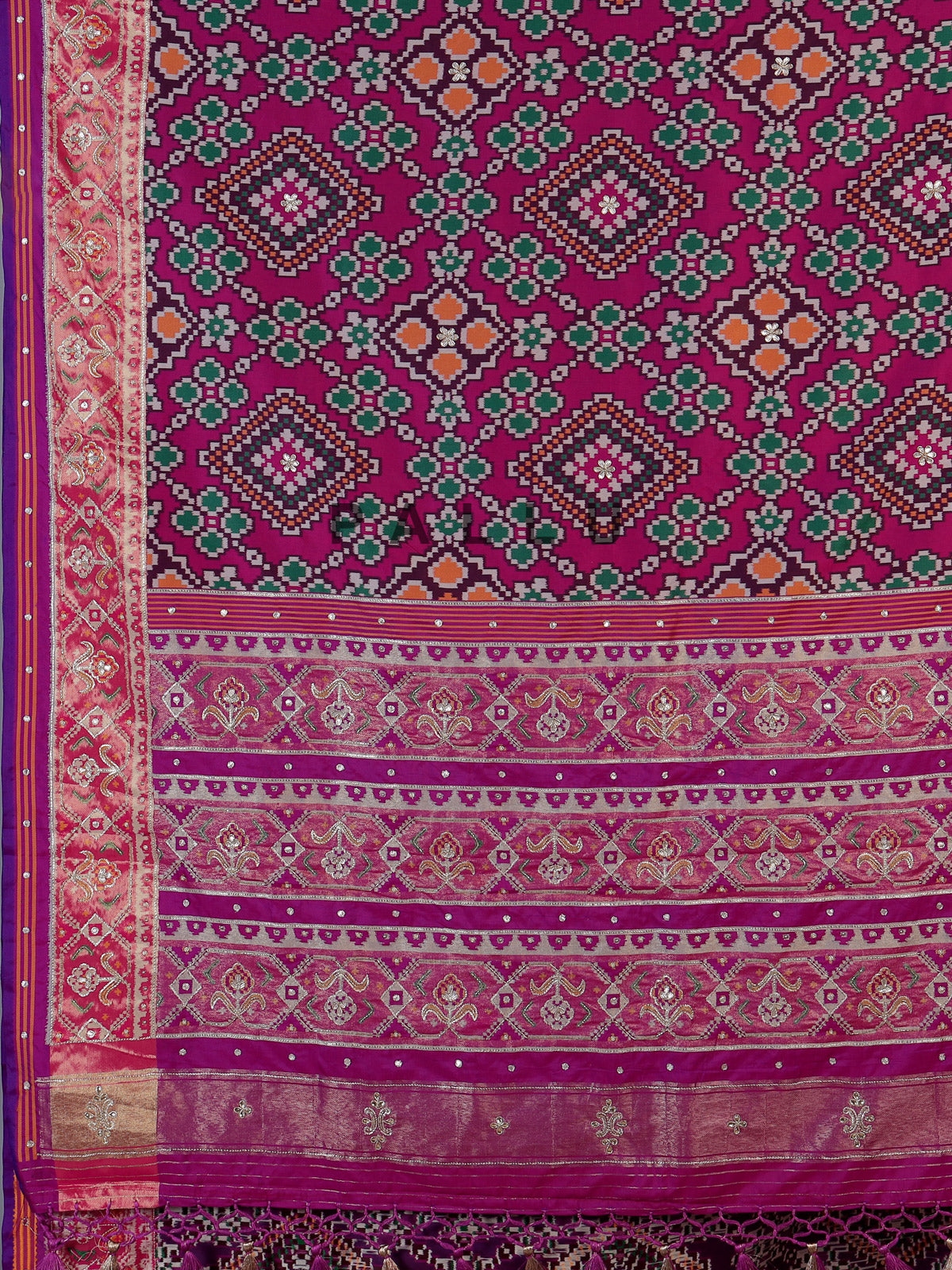 Magenta art patola silk saree with stone embellished elegance