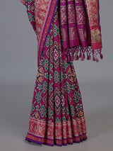 Magenta art patola silk saree with stone embellished elegance