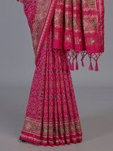 Rani pink art patola silk saree with rich stone work