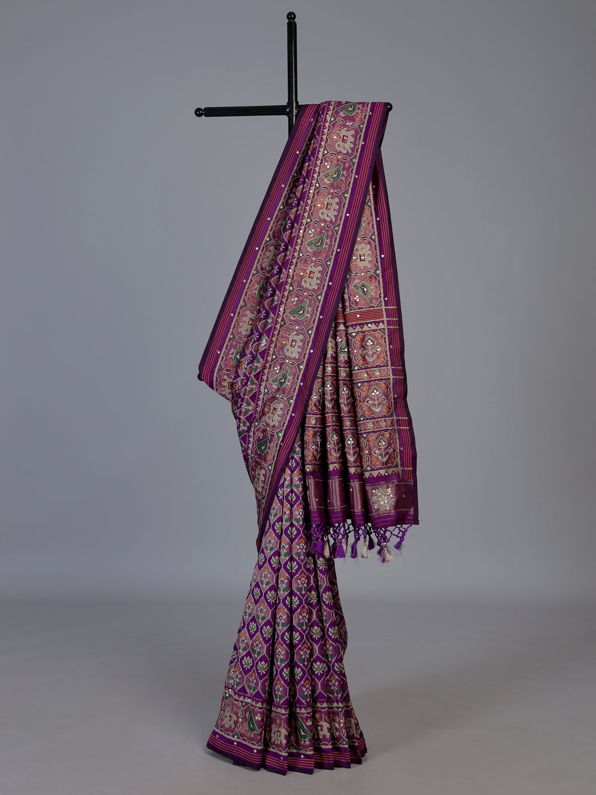 Purple art patola silk saree with animal motif handwork