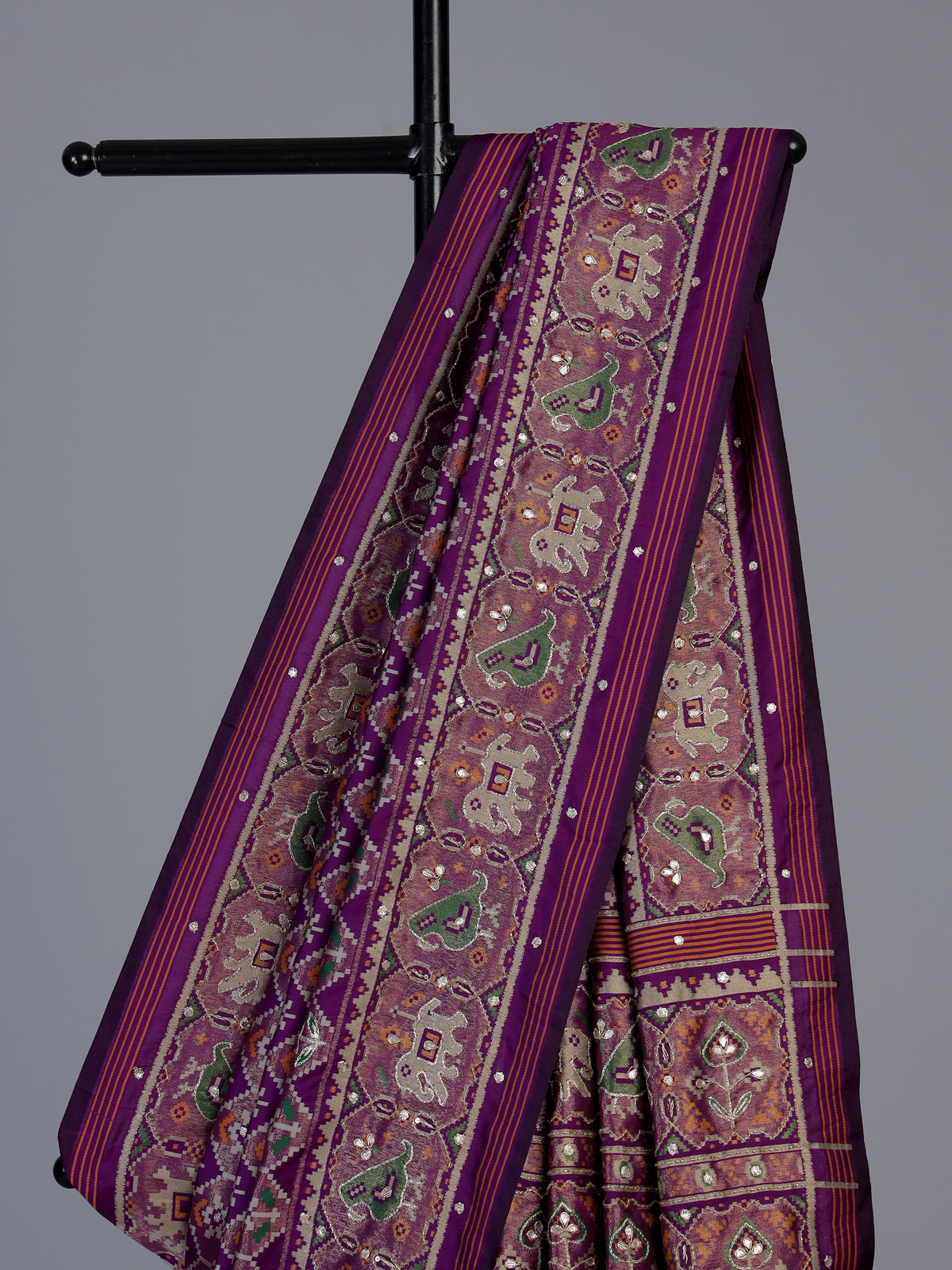 Purple art patola silk saree with animal motif handwork