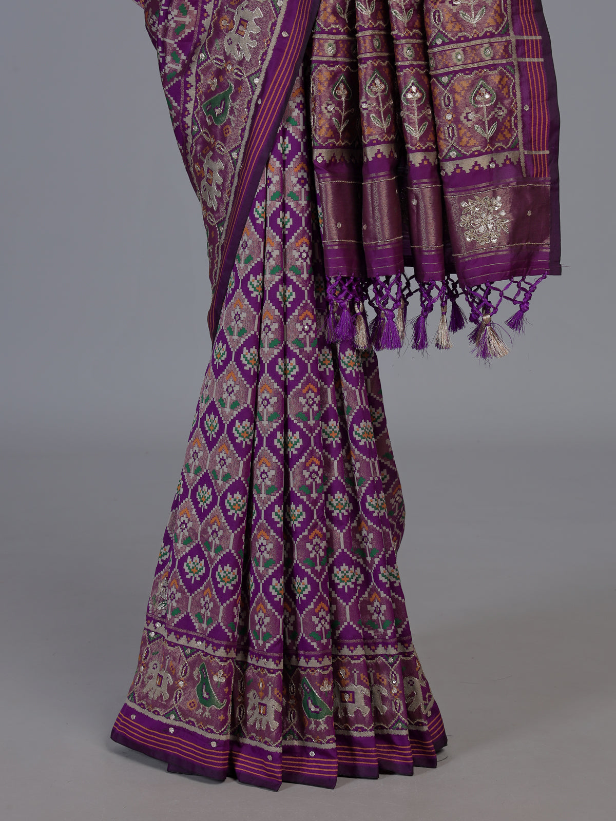 Purple art patola silk saree with animal motif handwork