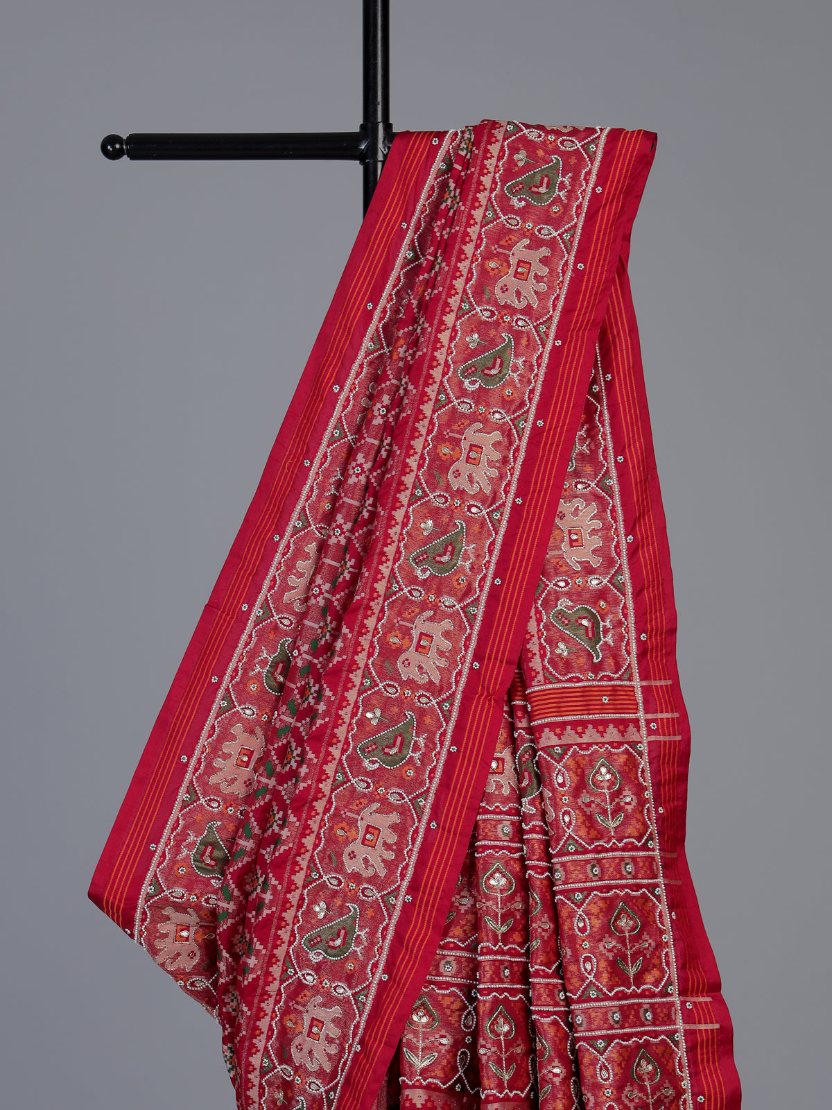 Red art patola silk saree with bird motifs elegance