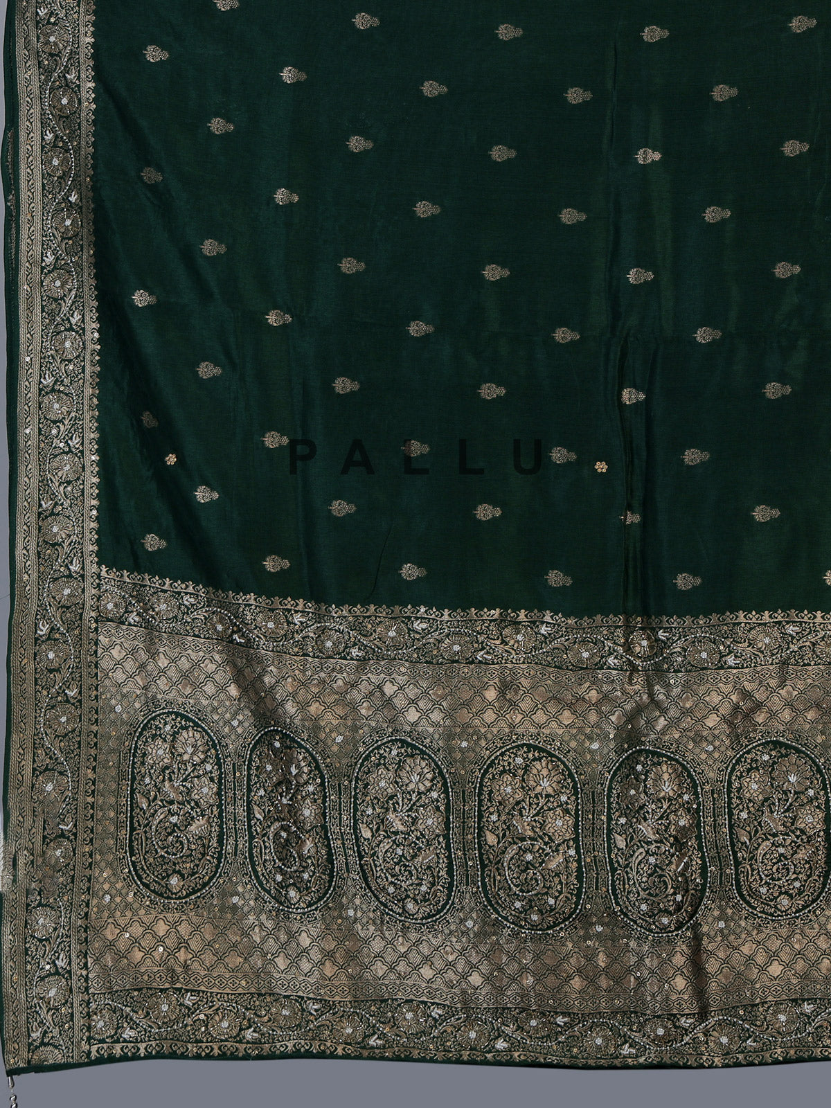 Green dola silk saree with rich butti elegance