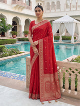 Orange dola silk saree with traditional butti work design
