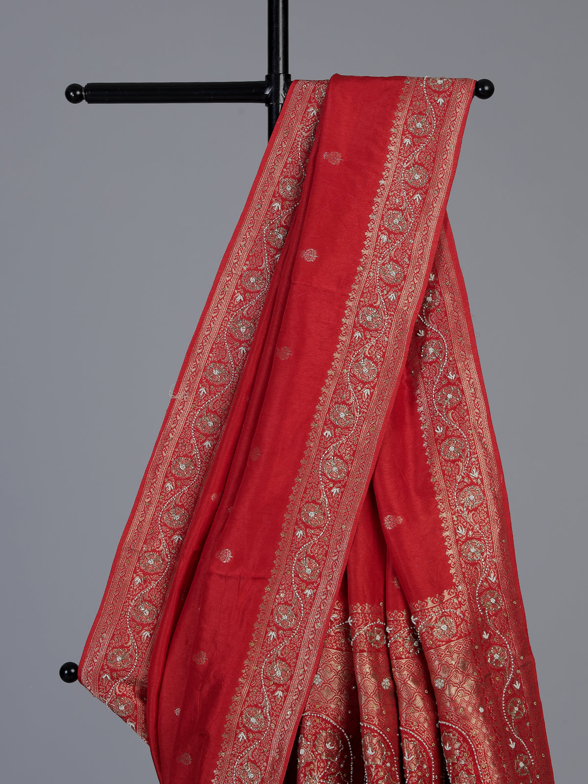 Orange dola silk saree with traditional butti work design