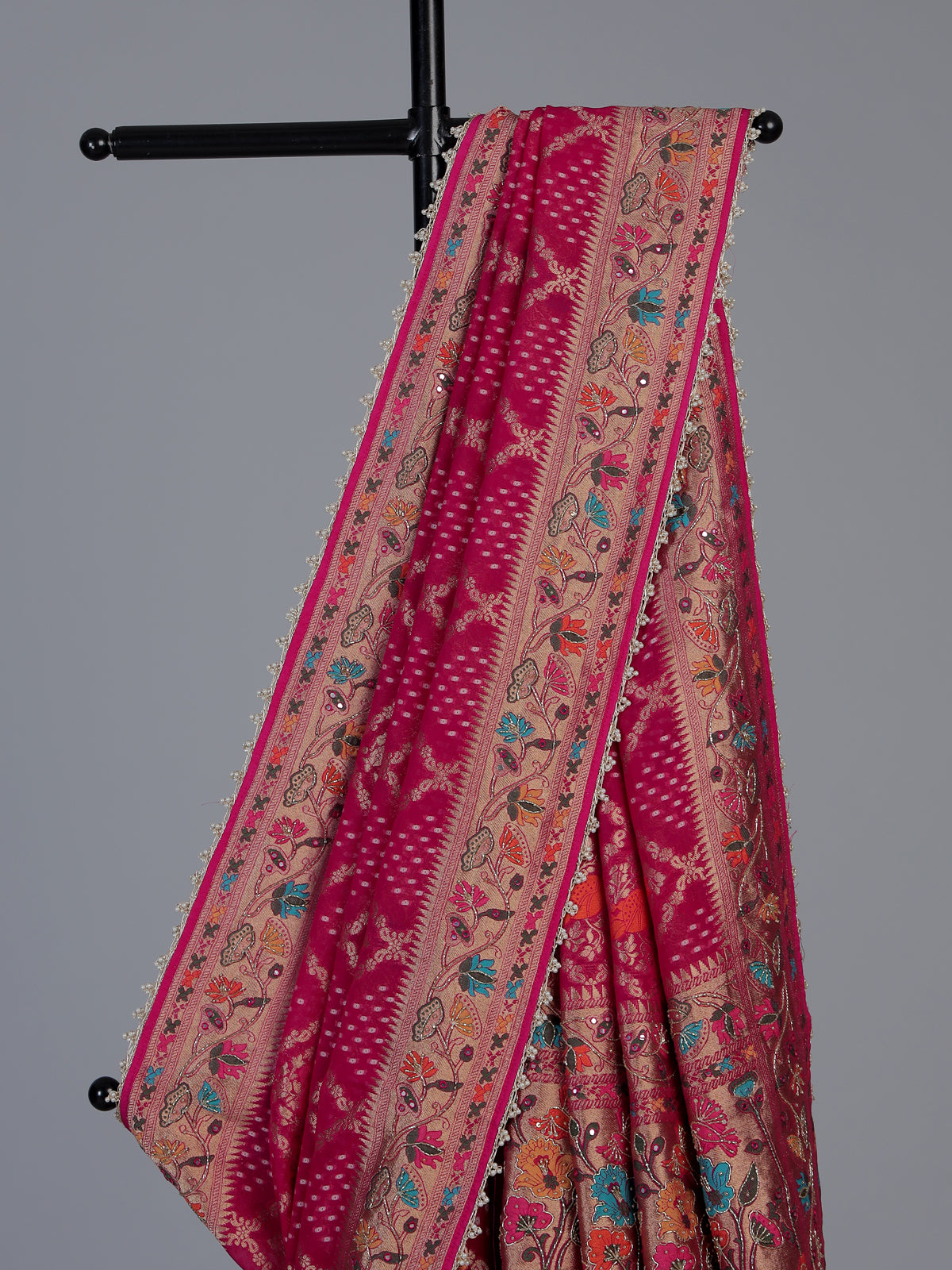 Pink georgette Bandhani saree with elephant motif handwork