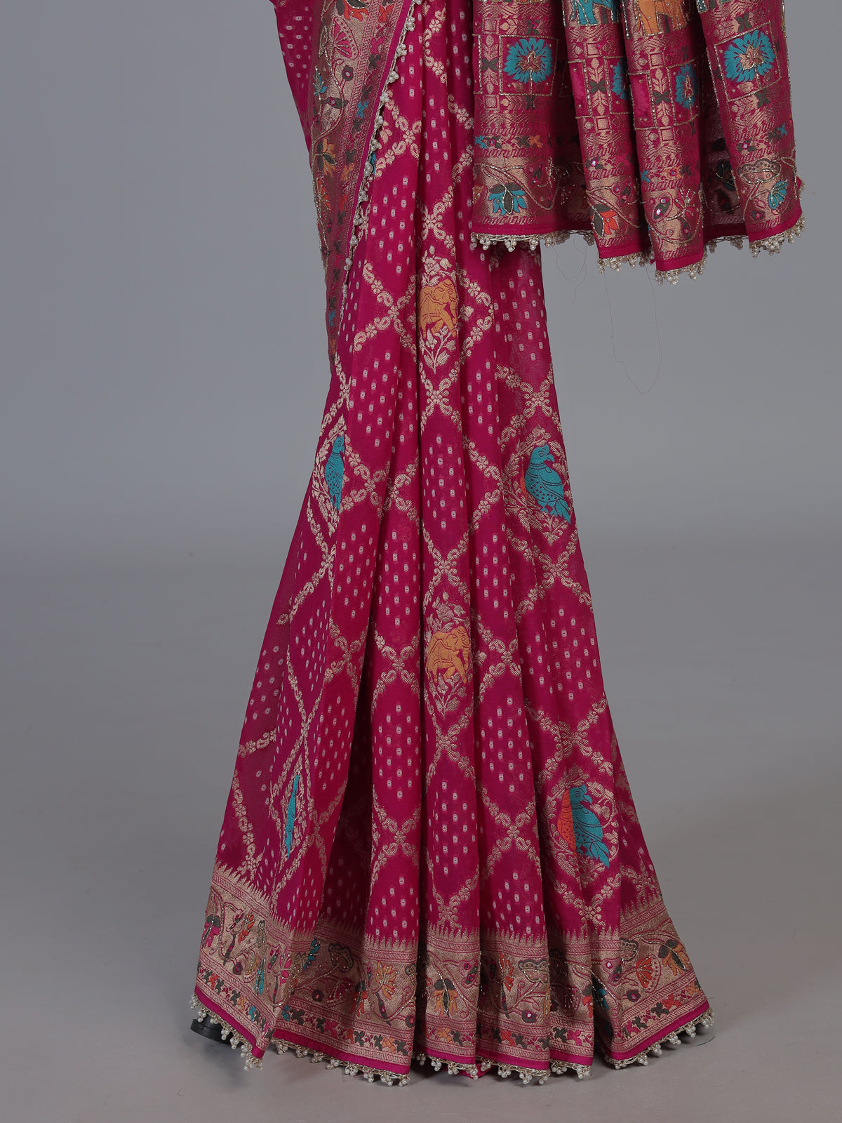 Pink georgette Bandhani saree with elephant motif handwork