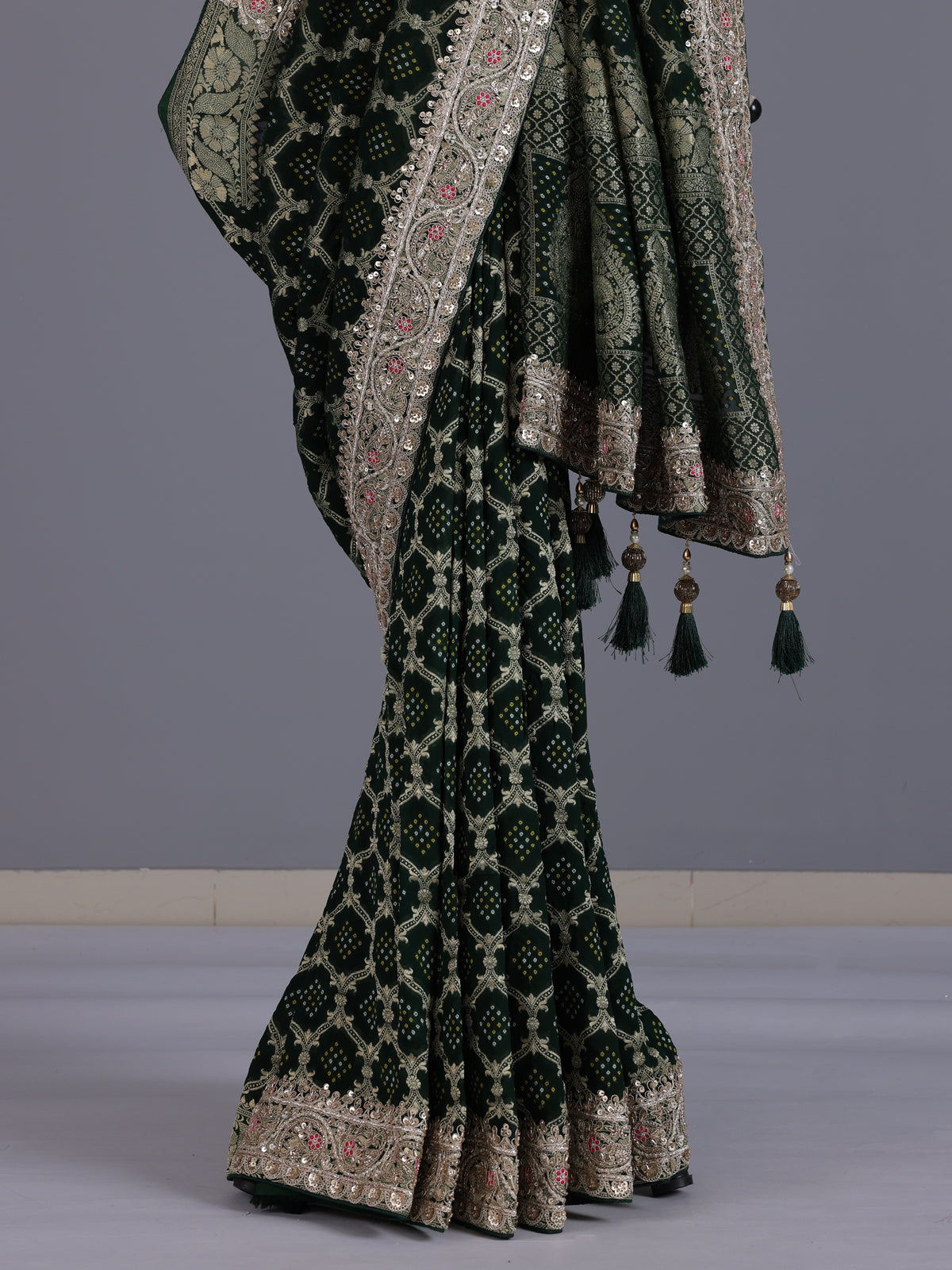 Green bandhani semi georgette saree with tassel pallu elegance
