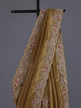 Gold tissue silk saree with bird motif border embellishments