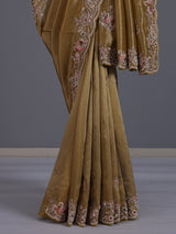 Gold tissue silk saree with bird motif border embellishments