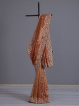Pastel orange tissue silk saree with elephant border festive elegance