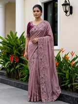 Pastel pink shimmer tissue saree with peacock border designer elegance
