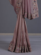 Pastel pink shimmer tissue saree with peacock border designer elegance