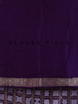 Purple dola silk bandhani saree with luxurious tassel pallu detailing