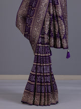 Purple dola silk bandhani saree with luxurious tassel pallu detailing