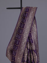 Purple dola silk bandhani saree with luxurious tassel pallu detailing