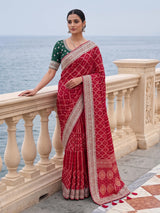 Rani pink semi georgette bandhani saree with festive tassel pallu