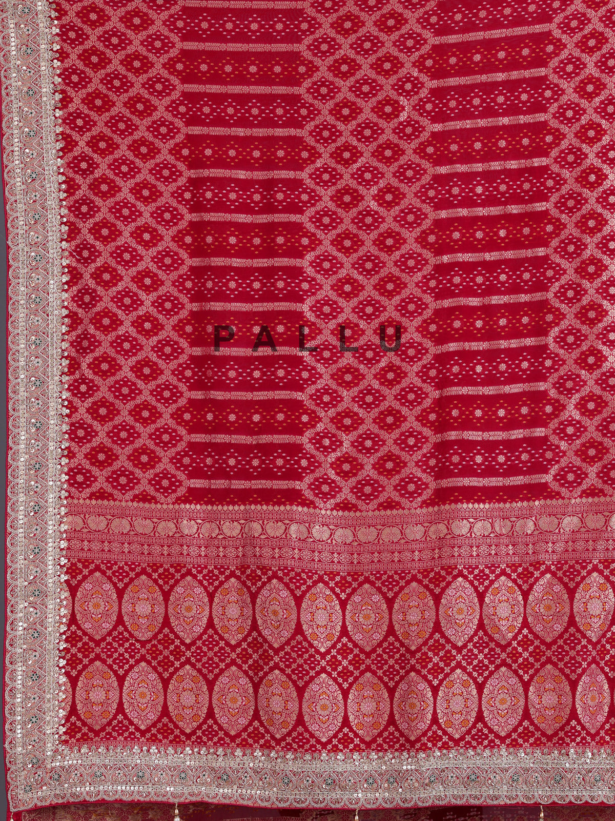 Rani pink semi georgette bandhani saree with festive tassel pallu