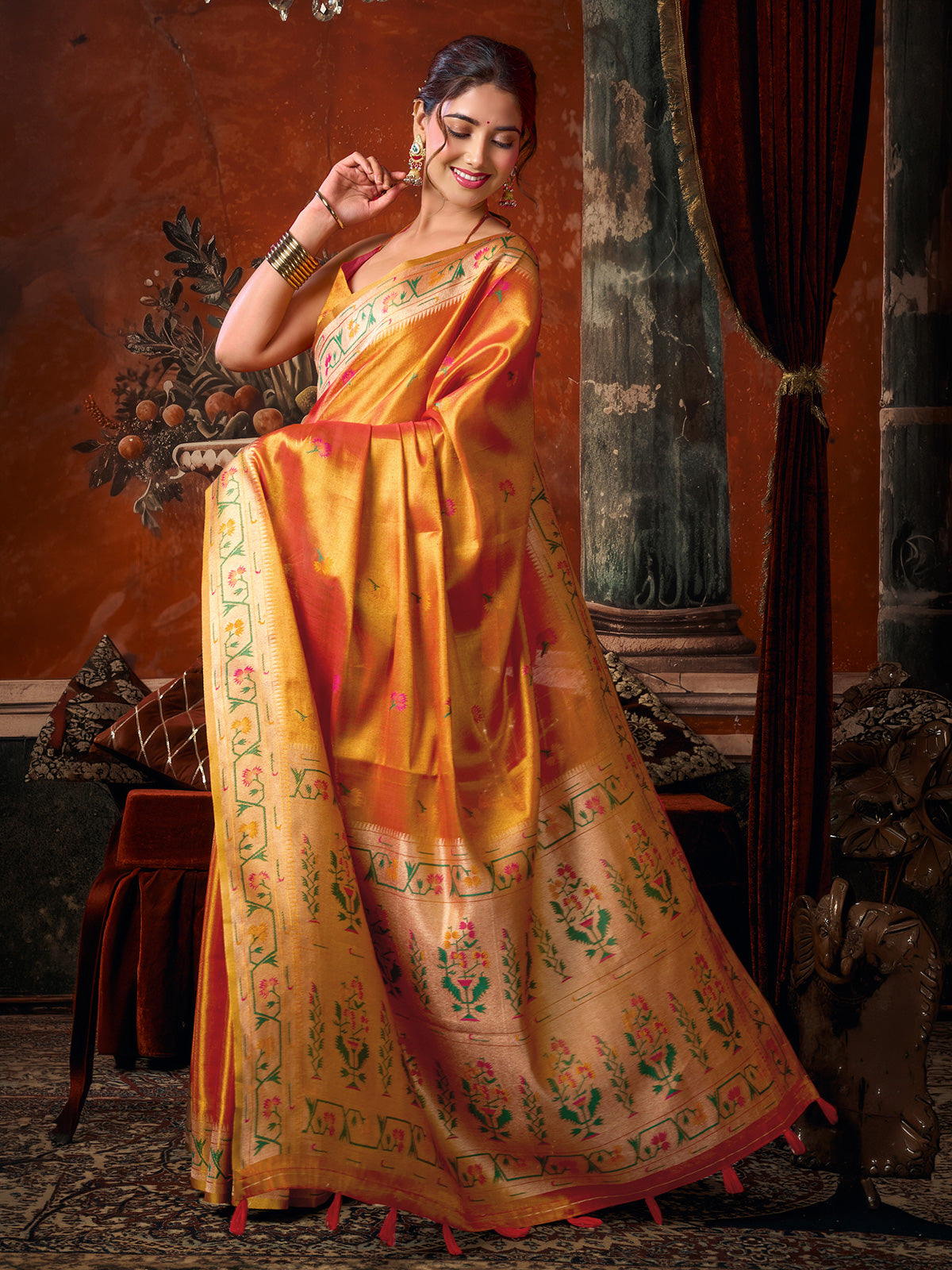 Orange elegant festive tissue silk saree