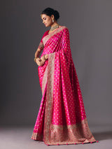Rani pink banarasi silk saree with butti work and tassels