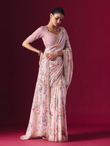 Dusty pink printed georgette saree with elegant embellished festive detailing