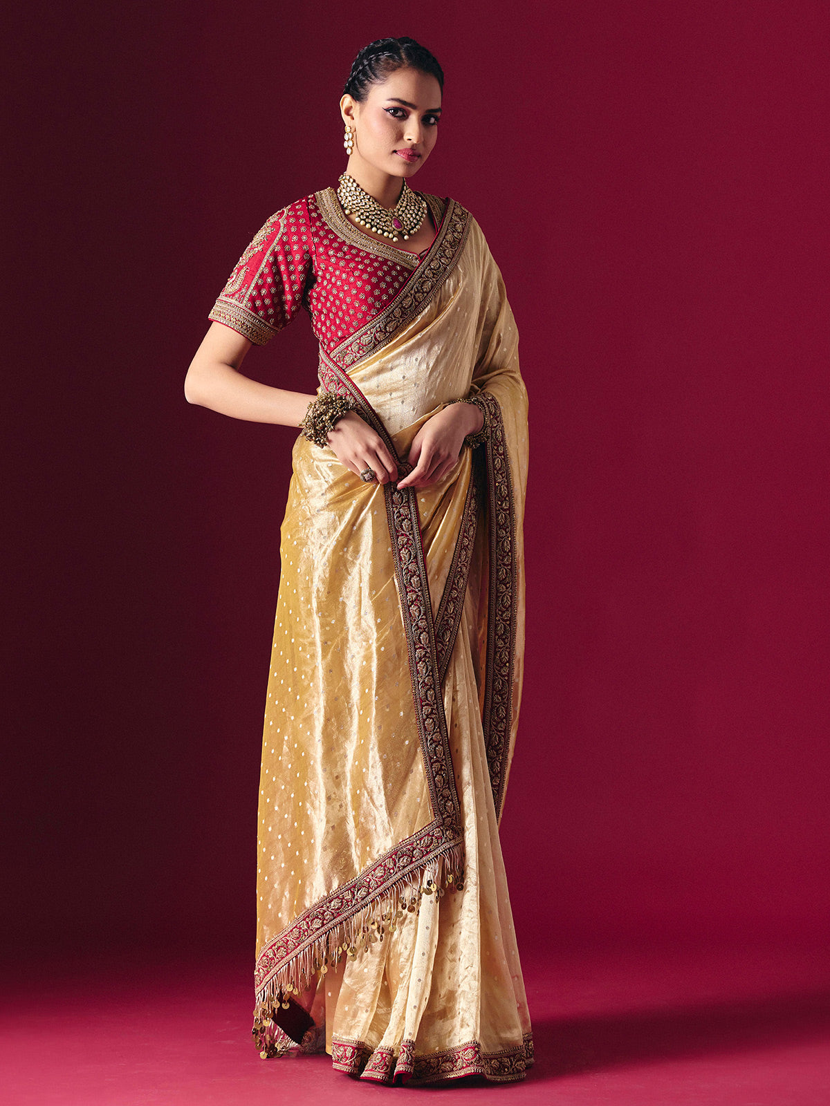 Pastel yellow tissue silk saree with luxurious zari zardosi embellishments
