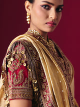 Pastel yellow tissue silk saree with luxurious zari zardosi embellishments