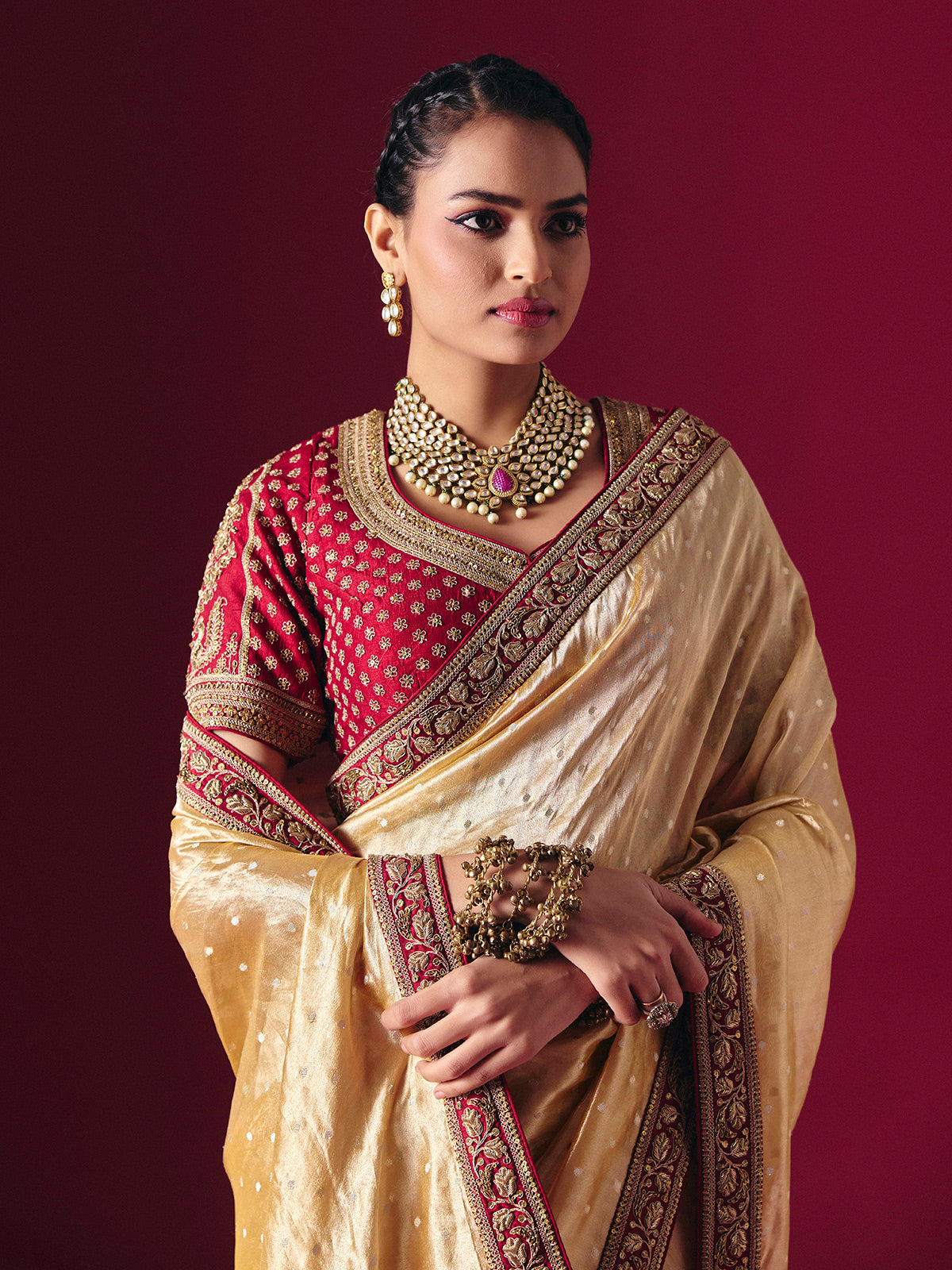 Pastel yellow tissue silk saree with luxurious zari zardosi embellishments