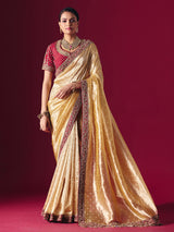 Pastel yellow tissue silk saree with luxurious zari zardosi embellishments