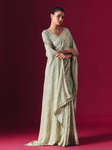 Sage green Lucknowi georgette saree with chikankari embellished designer elegance
