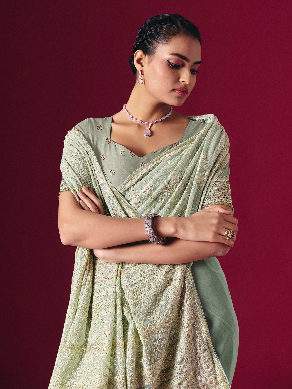 Sage green Lucknowi georgette saree with chikankari embellished designer elegance