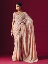 Light peach Lucknowi georgette saree with chikankari designer detailing