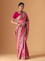 Magenta pink banarasi silk saree with regal embellished bridal elegance