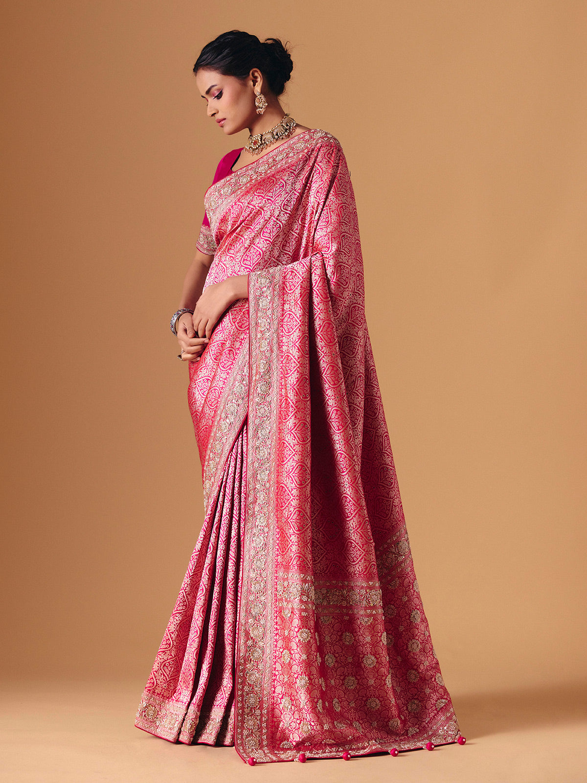 Magenta pink banarasi silk saree with regal embellished bridal elegance