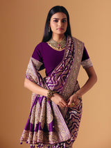 Deep purple banarasi silk saree with intricate bridal zari craftsmanship