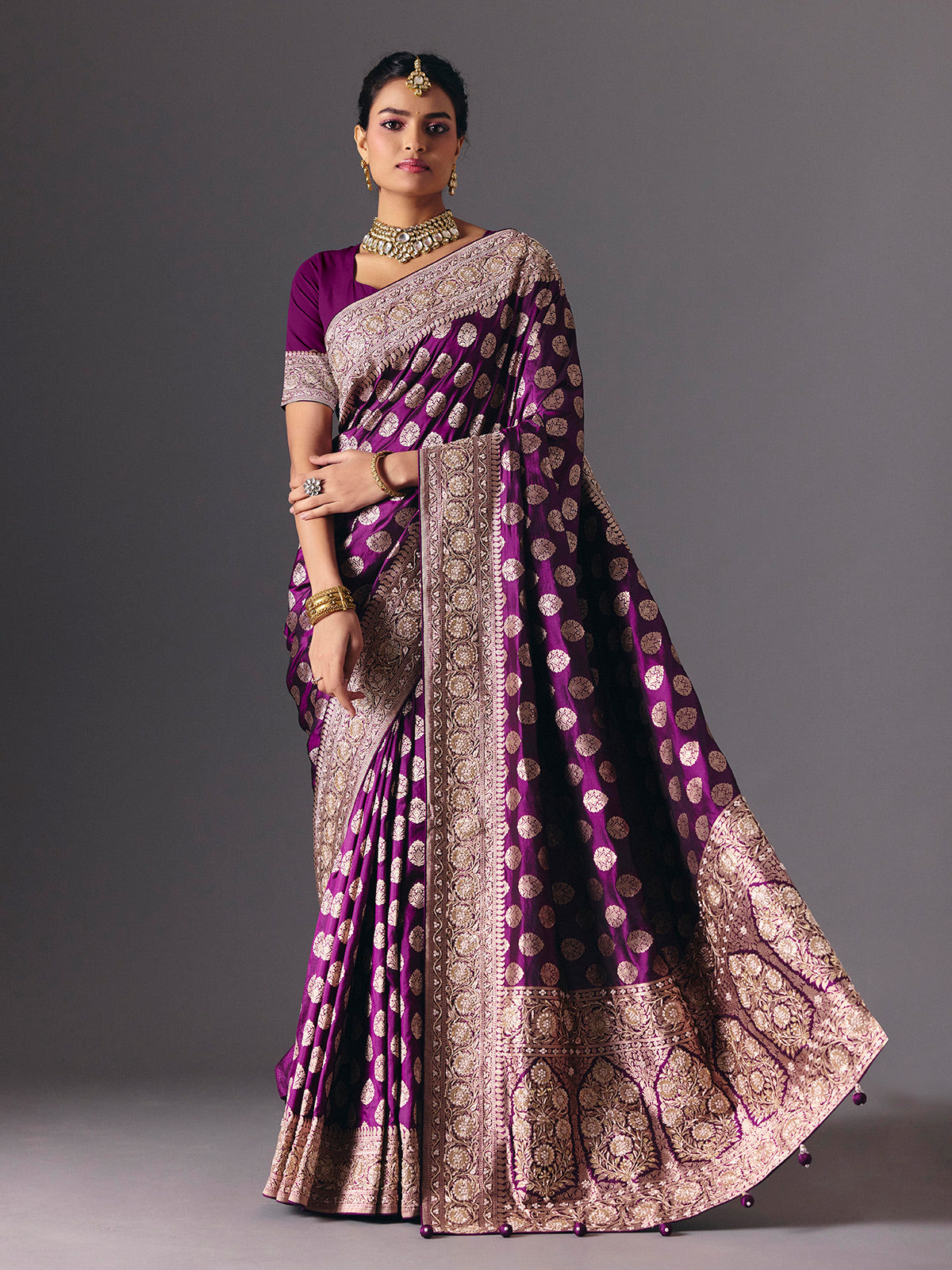 Deep purple pure banarasi silk saree with regal bridal embellishments