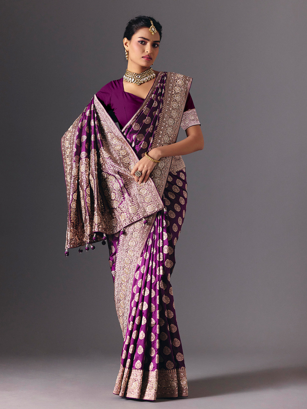 Deep purple pure banarasi silk saree with regal bridal embellishments