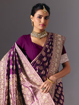 Deep purple pure banarasi silk saree with regal bridal embellishments