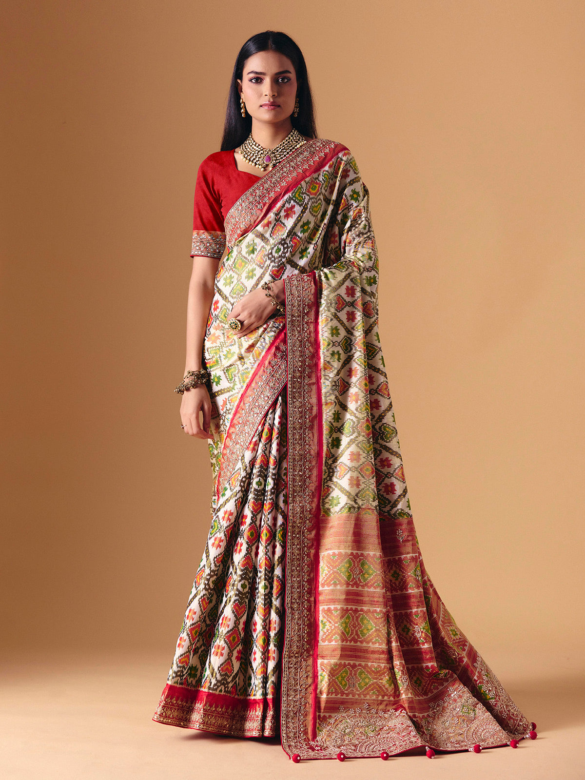 Off white Hyderabadi patola silk saree with gota pati elegance