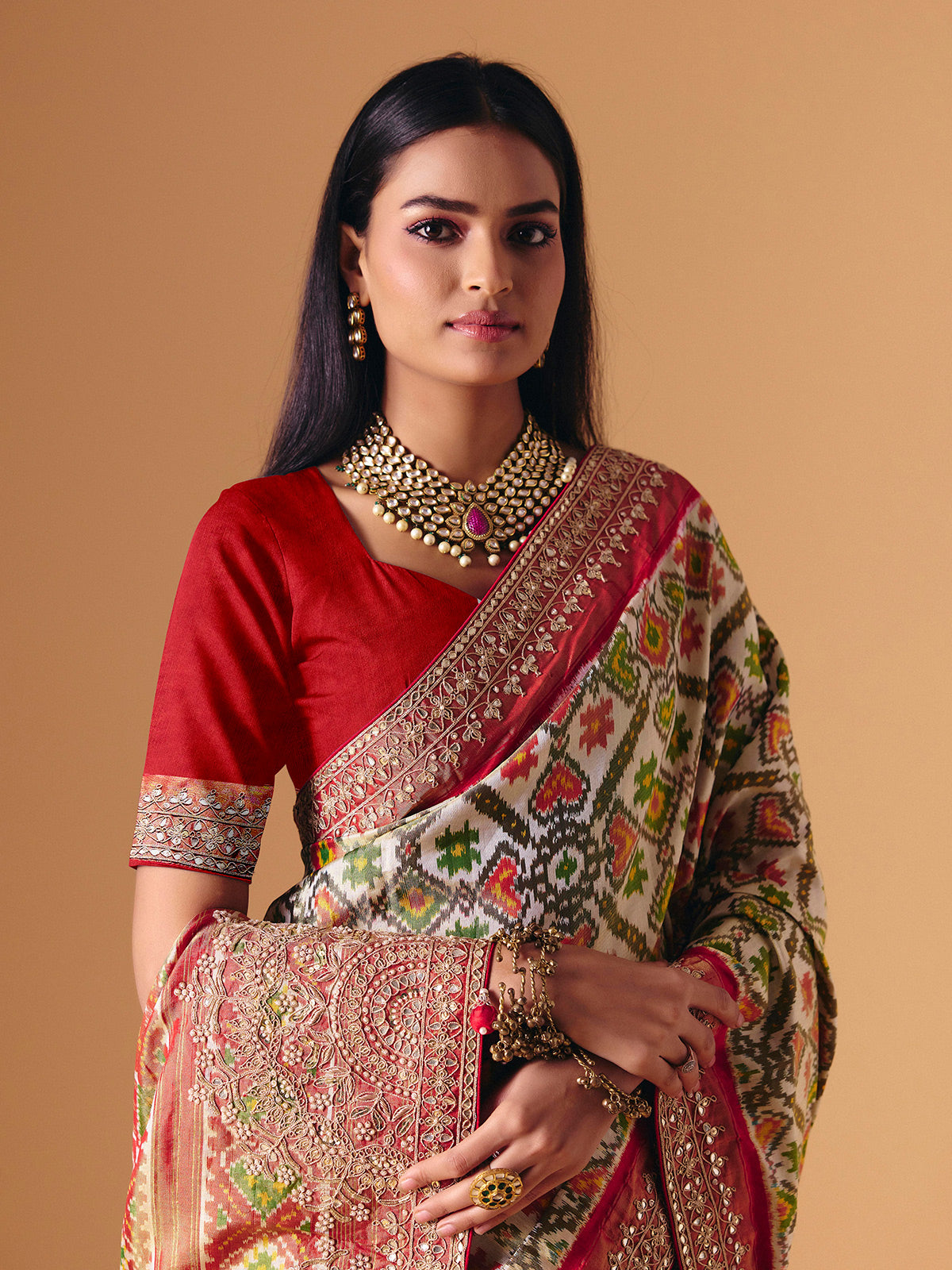 Off white Hyderabadi patola silk saree with gota pati elegance