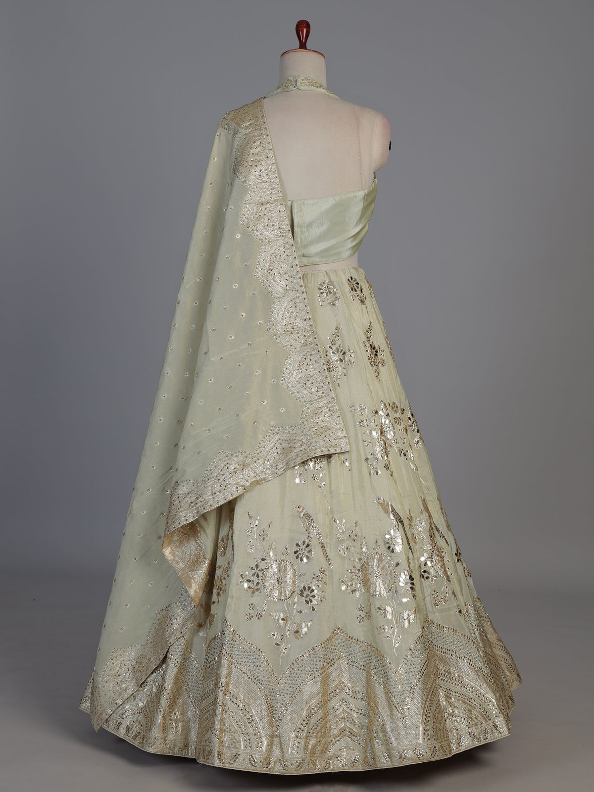 Pista green bird motif silk lehenga choli with dupatta