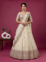 Cream silk designer embellished lehenga choli with tassel dupatta