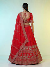 Red raw silk elephant and motif bridal lehenga choli