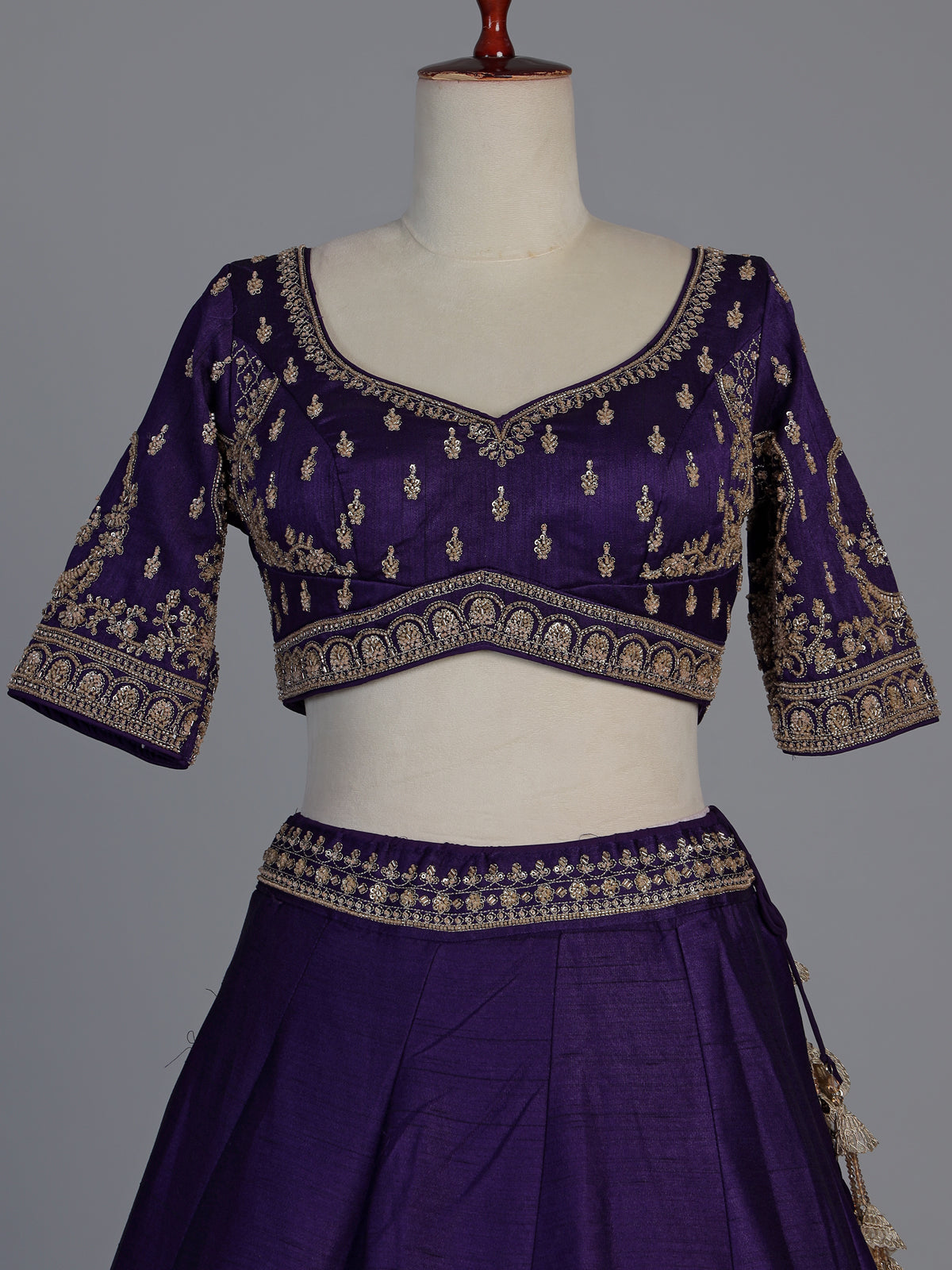 Royal purple raw silk elephant and peacock motif lehenga choli